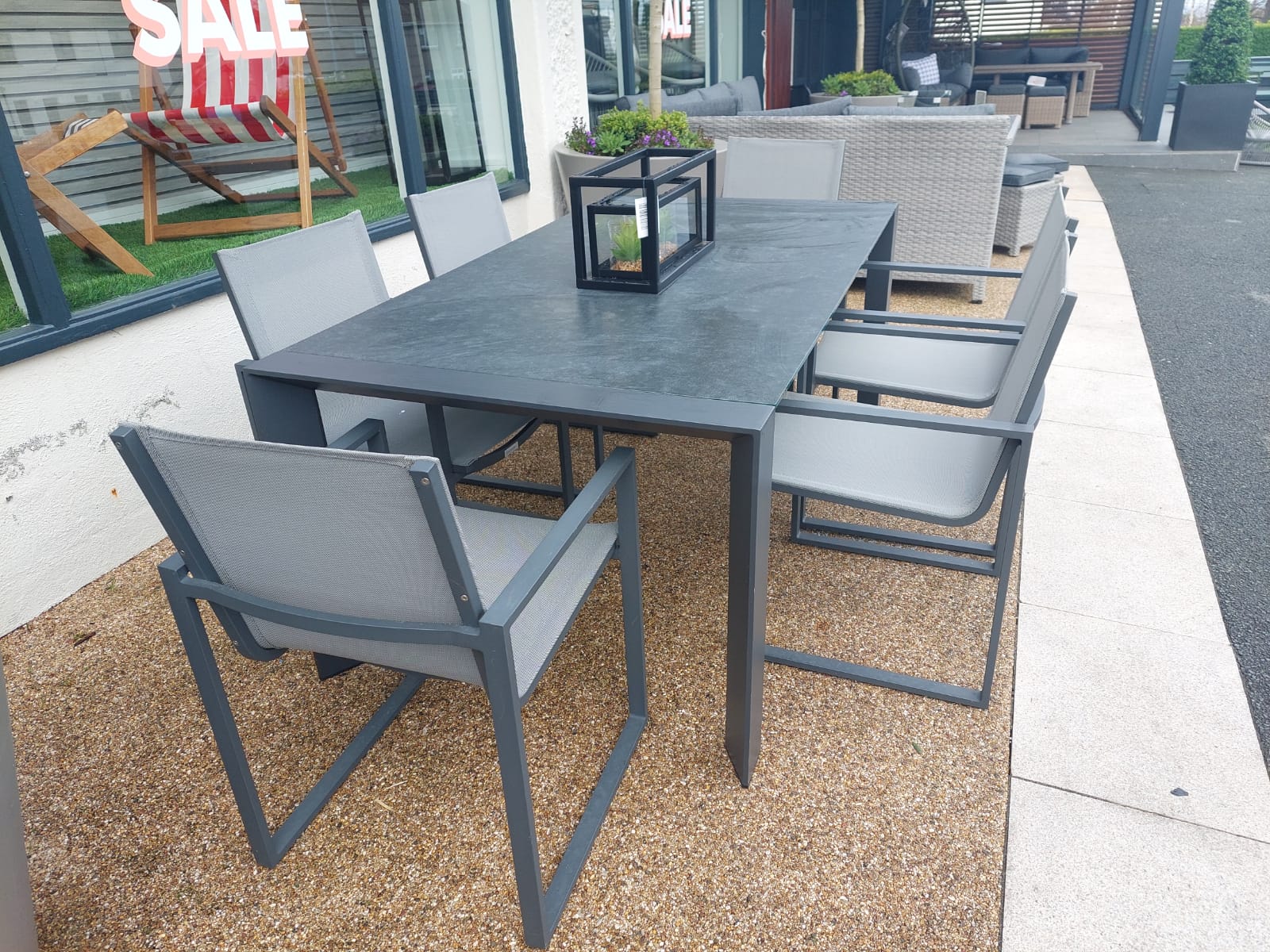 Orlando Aluminum and Glass Table With Belluno Dining Chairs