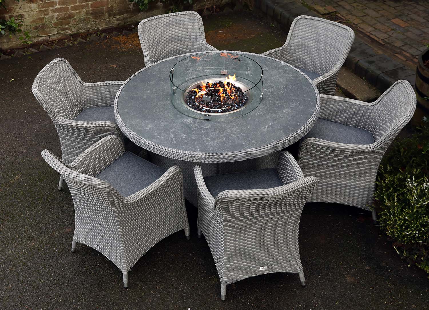 Catalan Six Seater Round Outdoor Dining Set With Fire Pit Table