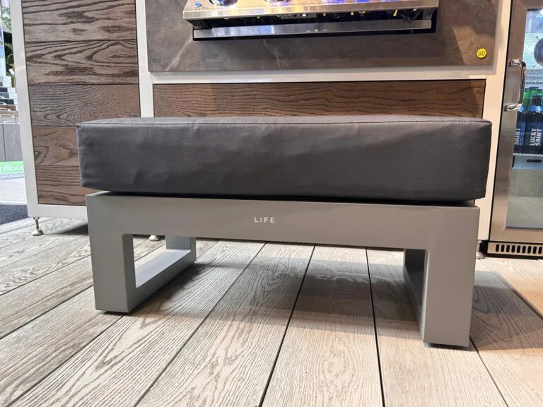 Mallorca bench, outdoor bench, patio furniture, all weather cushion, light grey frame and anthracite cushion from life. Furniture for sale, lifestyle picture, front view