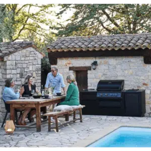 Napoleon Outdoor Kitchen with cooking and enjoying with family