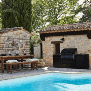 Napoleon Outdoor Kitchen in lifestyle setting for outdoor cooking and dining.