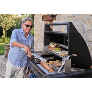 Napoleon Outdoor Kitchen for outdoor cooking on built in BBQ grill head in matt black.