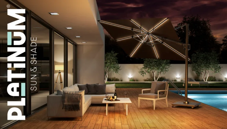 Platinum Challenger T2 Glow 3x3m Anthracite Free Arm Parasol During Night Lifestyle Image