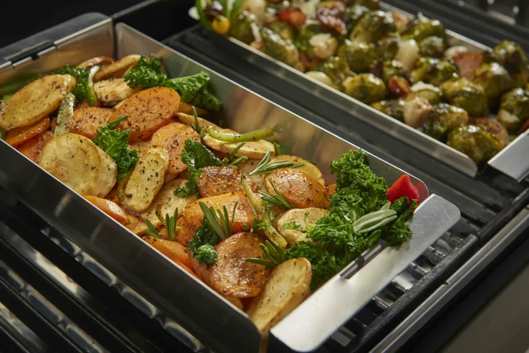 Broil King Narrow Wok Propped Lifestyle - Broil King BBQ Specialists Ireland