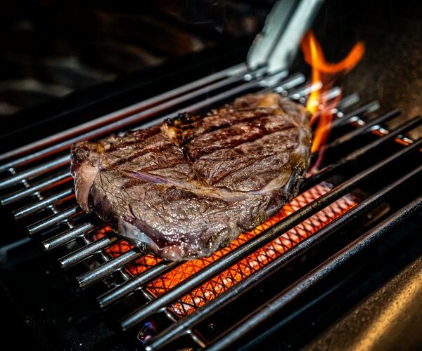 Broil King Regal 590 IR with Steak on Grill