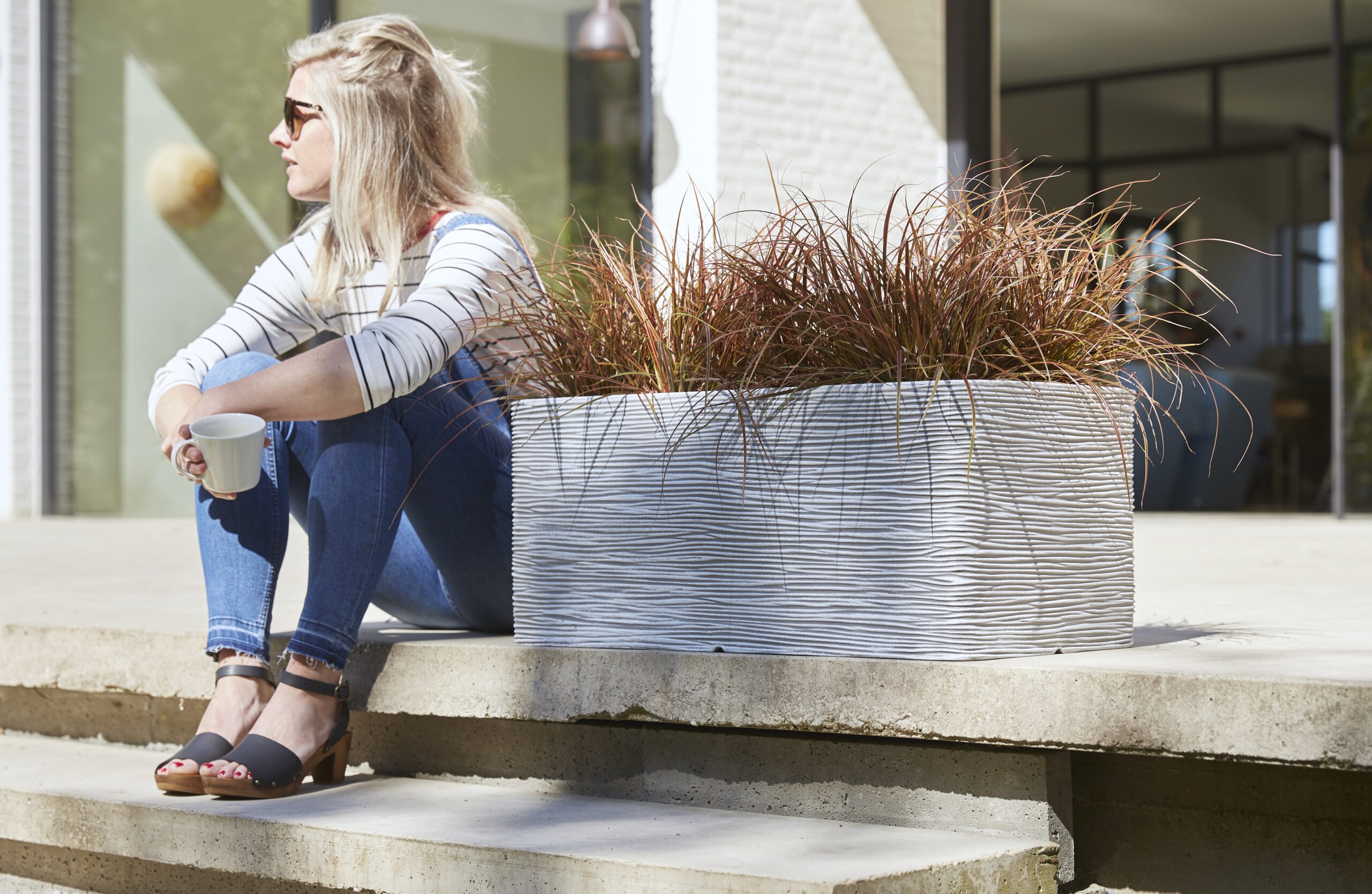 Capi Patio Rectangular Planter in Ivory colour placed in a lifestyle setting