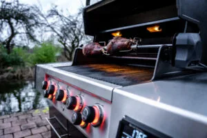 Broil King Q 590 IR BBQ with Chicken on Rotisserie Grill