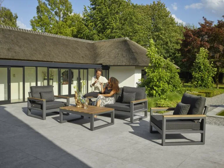 Soho Two Seats Bench With Armrests in a Lifestyle Setting - Outdoor Furniture - Premium Garden and Patio Furniture