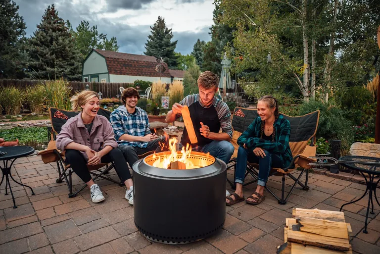 Solo Stove outdoor scene Yukon firepit, smokeless firepit for sale in Dublin Ireland, Patio wood fire lifestyle.