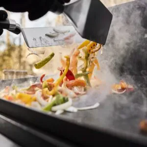 Buy All New Weber Slate 76cm premim branded, versatile gas Griddle barbecue Sale in Ireland. Live cooking Demo on 1st April