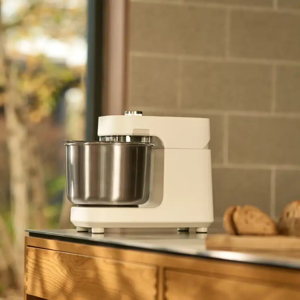 Halo pro white variant kneading pizza dough on kitchen counter top.