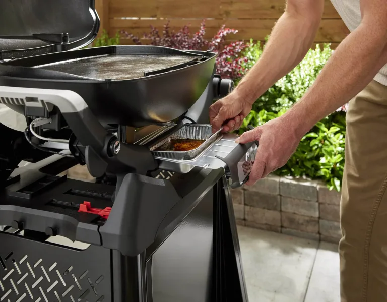 Weber backyard patio gas Gas BBQ Ireland lifestyle Q2200 N grease tray for sale from The Outdoor Scene