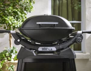 Weber backyard patio gas Gas BBQ Ireland closeup lifestyle Q2200 N for sale from The Outdoor Scene