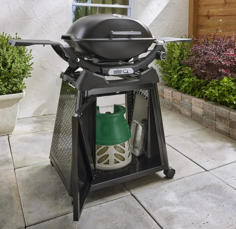 Weber backyard patio gas Gas BBQ Ireland lifestyle Q2200 N with side table and permanent cart for sale from The Outdoor Scene