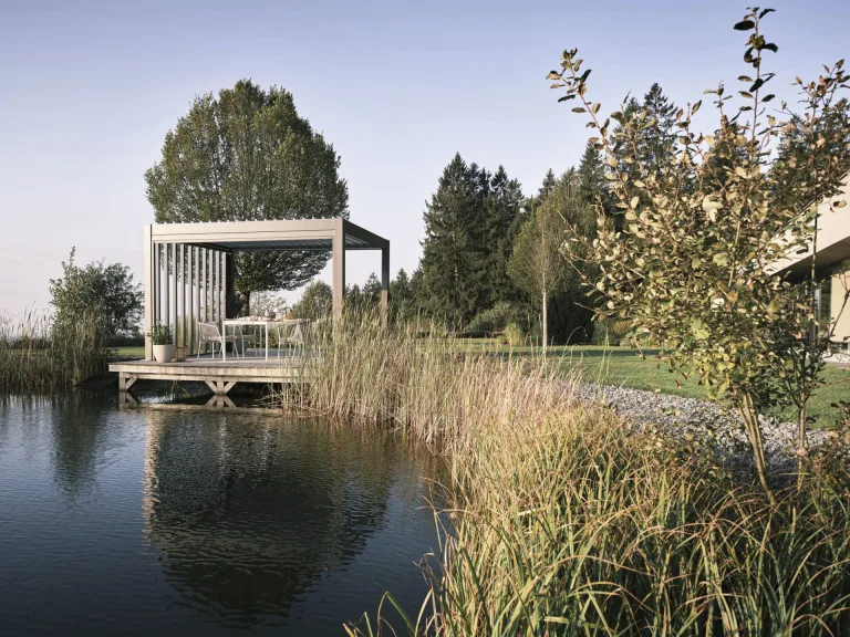 Biohort DIY Pergola in Ireland for sale from The Outdoor Scene. Pergola near lake with 20 years of warranty