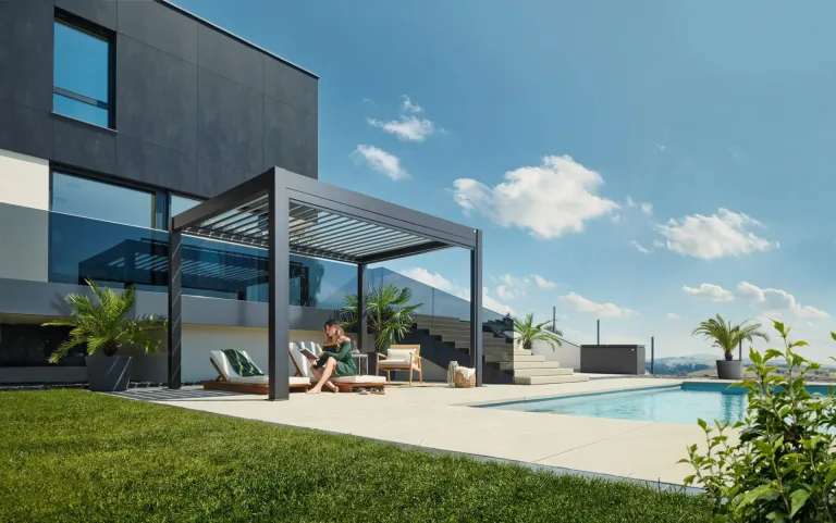 Biohort Pergola 4m x 3m in outdoor scene creating a garden Oasis. Buy from The Outdoor Scene Premium Garden Center in Ireland