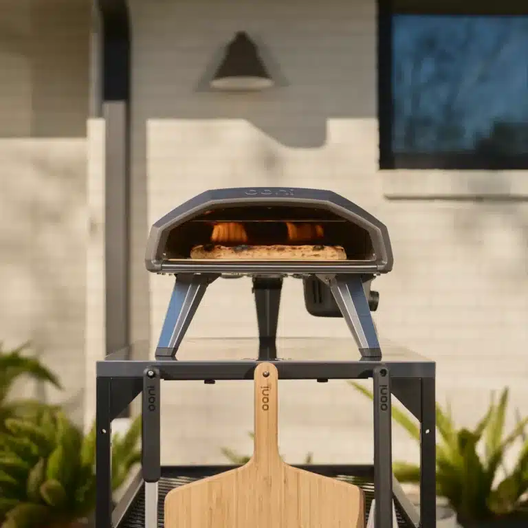 Ooni Koda 2 outdoor pizza oven on modular ooni table and bamboo pizza peel. All for sale in Ireland from the outdoor scene.