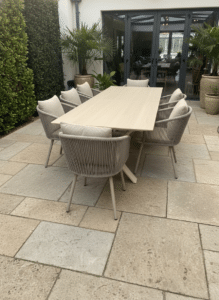 Albatros Extendable Dining Table for sale from The outdoor scene, Dublin 14, Ireland. 6 seater sand stone top with 6 X harbour Chairs