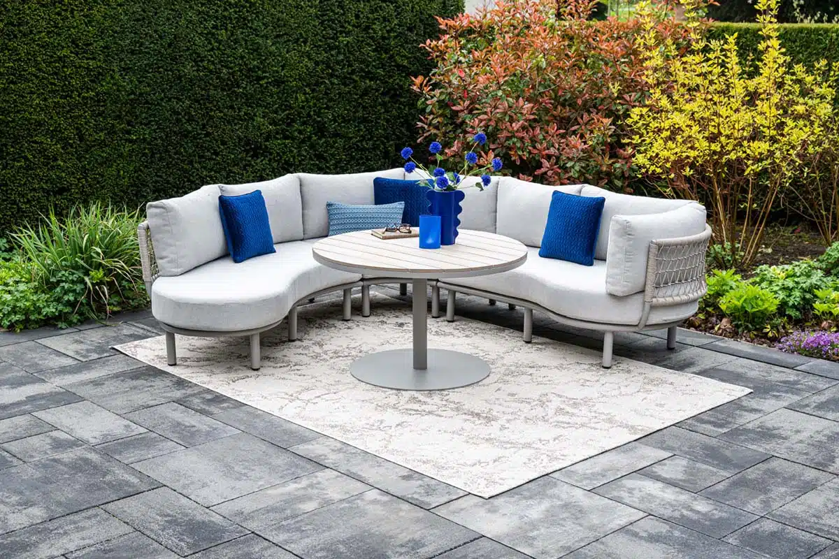 Matera Dining and Lounging hybrid furniture set. Garden Impression, outdoor 3 piece set. lifestyle with table