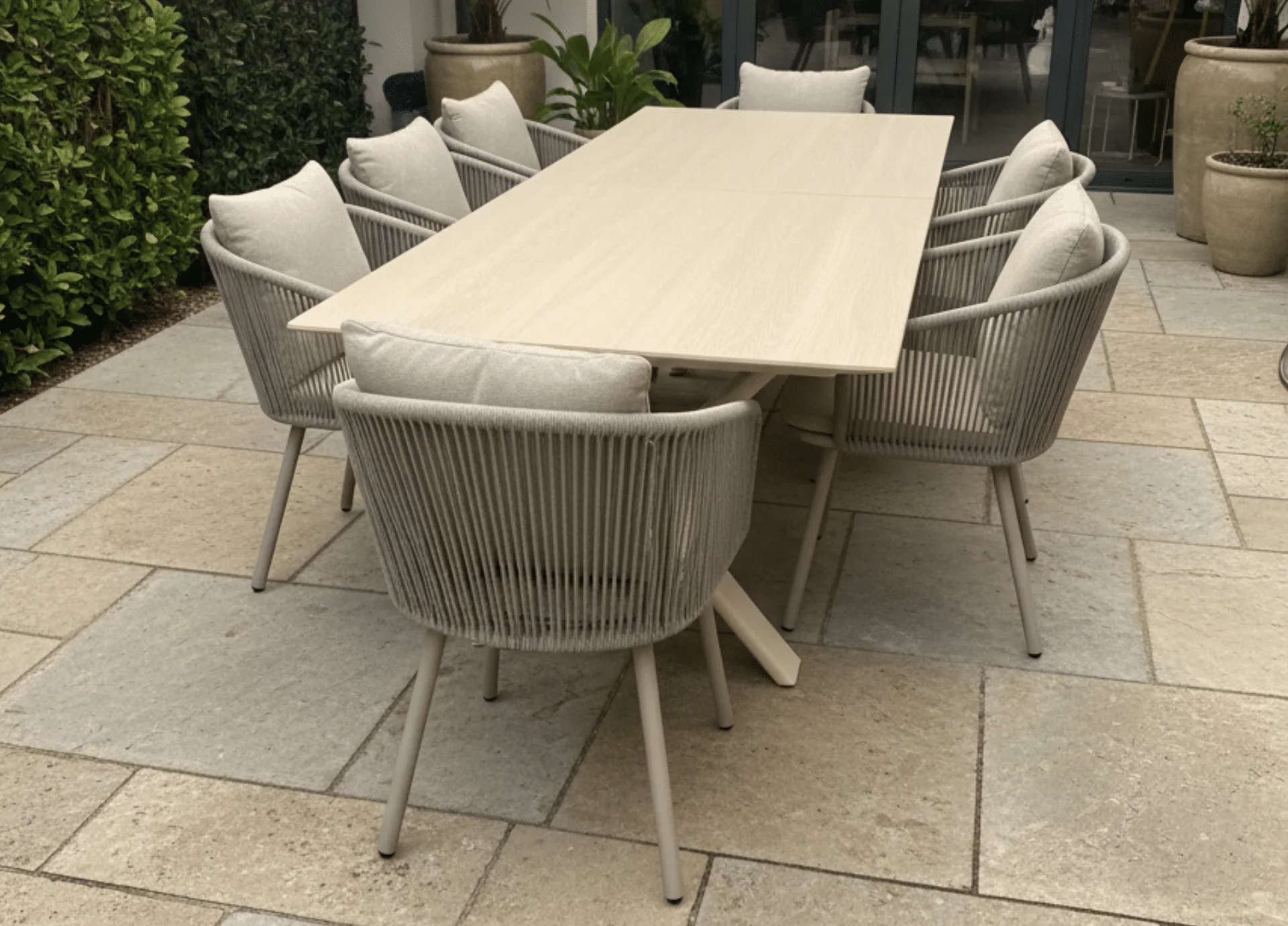 Albatros Extendable Dining Table for sale from The outdoor scene, Dublin 14,. 6 seater sand stone top with 6 X harbour Chairs