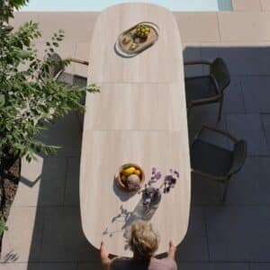 Albatros Organic 250 -310cm extendable Dining table in Bob Sand colour for sale from the Outdoor Scene, Dublin, Ireland. Lifestyle