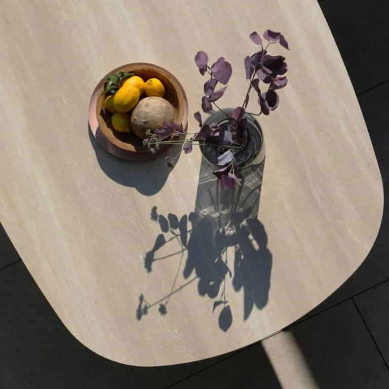 Albatros Organic 250 -310cm extendable Dining table in Bob Sand colour for sale from the Outdoor Scene, Dublin, Ireland. Lifestyle closeup in summer
