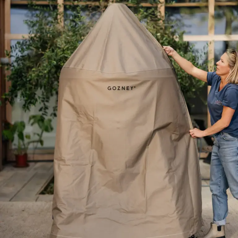Dome Gen 2 Series Stand Cover protecting a Gozney Dome pizza oven