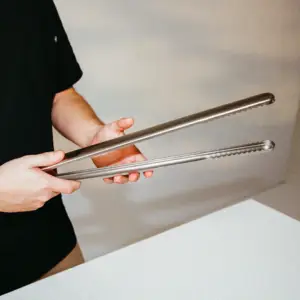 Gozney live-fire tongs for sale from The Outdoor Scene
