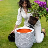 Capi Planter Ball Rib 43x41 Ivory Lifestyle Image - Outdoor Lifestyle Pots
